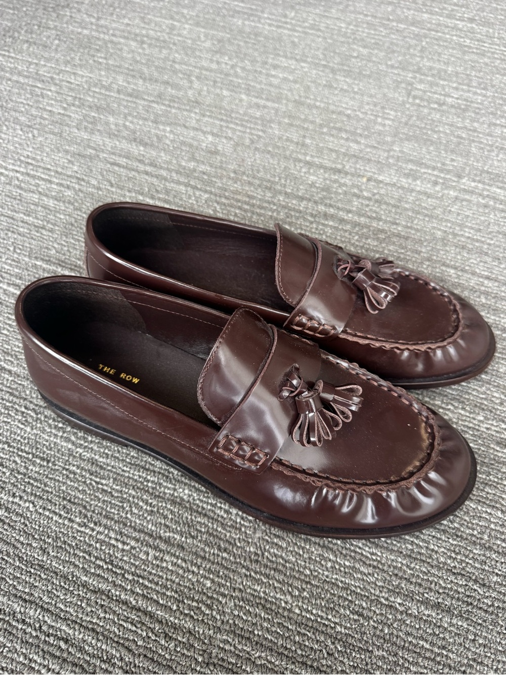 The Row Tassel Penny Loafers in Brown Leather